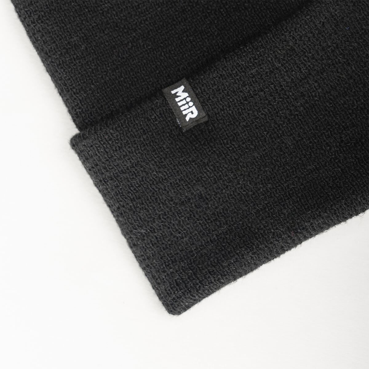 recycled-poly-fine-knit-beanie-z8 WebPDP-RecycledPolyFineKnitBeanie_Studio_TagDetail_Black__BNE005002OS.jpg
